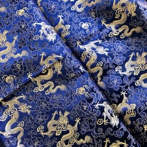 Fabric remnant gold dragons goal blue flowers satin